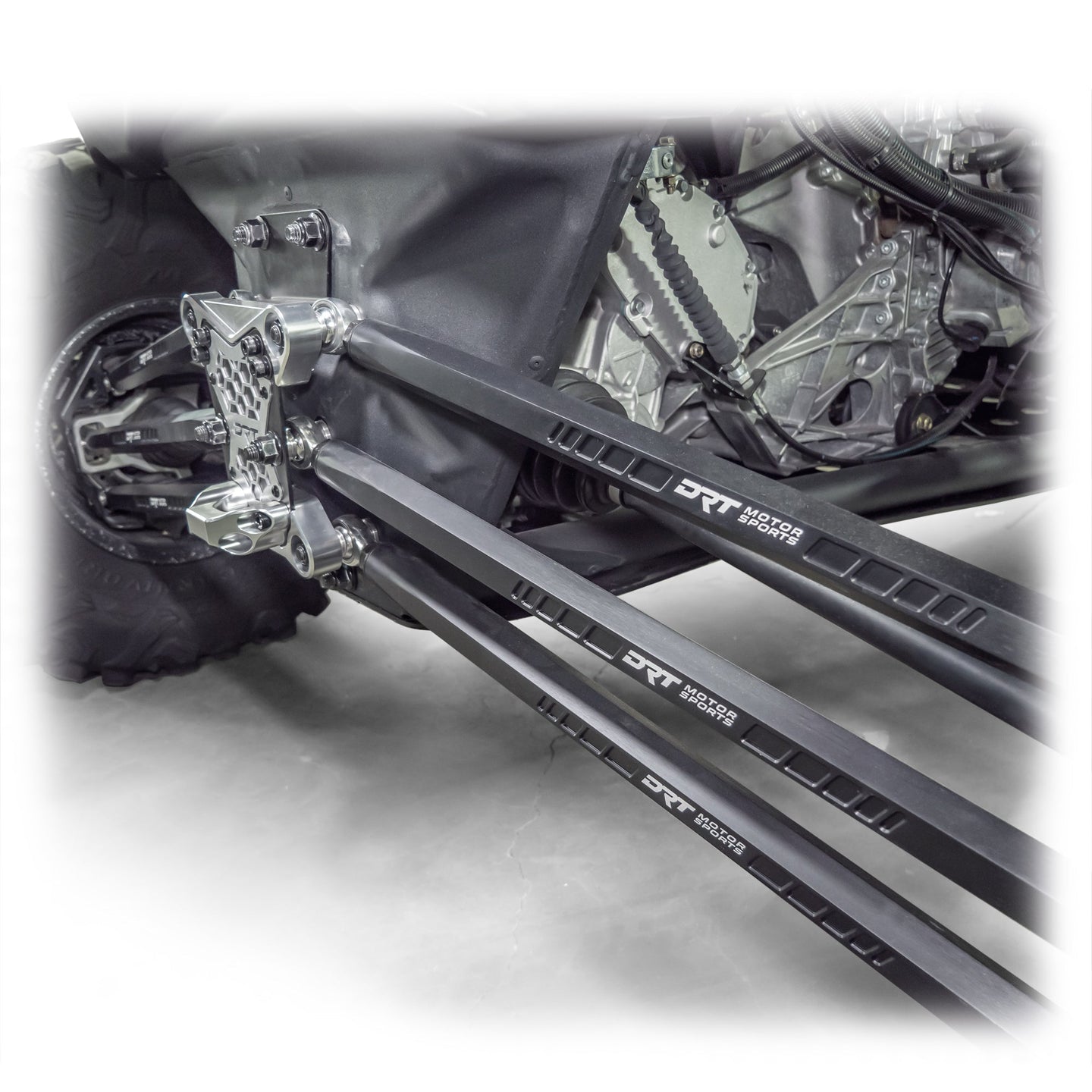 DRT Can-Am Maverick X3 2017+ Billet Aluminum 3-PC Radius Rod Plate Kit Full rear view from an angle